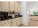 Butler's pantry featuring wine rack and storage at 3868 Whitewood Ct, Oviedo, FL 32766