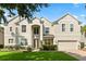 Beautiful two-story home featuring a well-manicured lawn and an attached two-car garage at 3868 Whitewood Ct, Oviedo, FL 32766
