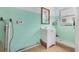 This bathroom features a sink, mirror, shower stall, and a window at 450 S Buena Vista Ave, Orlando, FL 32835