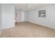 Spacious bedroom with tile flooring, ceiling fan, neutral walls, and a window for natural light at 450 S Buena Vista Ave, Orlando, FL 32835