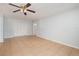 This living room features light walls, a ceiling fan, and tile floors at 450 S Buena Vista Ave, Orlando, FL 32835