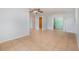 This spacious living room has tile floors and multiple entryways at 450 S Buena Vista Ave, Orlando, FL 32835