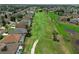 Aerial view of homes backing onto a green area, providing a serene and spacious living environment at 468 Jaybee Ave, Davenport, FL 33897