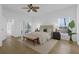 Bright bedroom featuring tile floors, neutral decor and a patio door to an outdoor area at 468 Jaybee Ave, Davenport, FL 33897