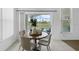 Dining area featuring backyard views through large glass doors for seamless indoor-outdoor living at 468 Jaybee Ave, Davenport, FL 33897