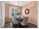 The dining room features laminate flooring and views of the outside at 468 Jaybee Ave, Davenport, FL 33897