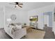 Comfortable living room with modern sofa and furnishings and a large area rug at 468 Jaybee Ave, Davenport, FL 33897