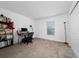 Bedroom with carpet, closet, and a window at 4990 Four Strand Ct, St Cloud, FL 34769