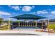 A sheltered community mailbox area in a modern residential development at 4990 Four Strand Ct, St Cloud, FL 34769
