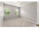 Comfortable bedroom with neutral walls and carpets, offering a serene and inviting space at 5032 Beach River Rd, Windermere, FL 34786