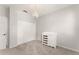 Comfortable bedroom features closet, a changing table and a chandelier at 5032 Beach River Rd, Windermere, FL 34786