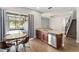 Open kitchen with a view of a screened-in patio area through sliding glass doors at 5032 Beach River Rd, Windermere, FL 34786