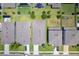 Aerial view of the home showing the roof, nearby neighborhood homes, and the yard space at 5306 Rochester Pl, St Cloud, FL 34771