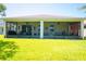 A screened-in lanai featuring an outdoor living space, perfect for entertaining or relaxing at 5306 Rochester Pl, St Cloud, FL 34771