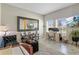 Well-lit office space with a large mirror, comfortable seating, and modern decor at 5306 Rochester Pl, St Cloud, FL 34771