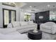 Bright living room featuring a comfortable seating arrangement and modern decor at 6917 Roman Ct, Clermont, FL 34714