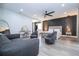 Stylish main bedroom showcasing sitting area, chandelier, and decorative lighting at 6917 Roman Ct, Clermont, FL 34714