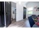 Bright office showing access to the bathroom with a modern vanity and a patterned towel at 6917 Roman Ct, Clermont, FL 34714