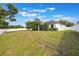 Spacious backyard enclosed by a white fence at 8067 Crushed Pepper Ave, Orlando, FL 32817
