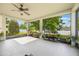 Screened-in lanai perfect for enjoying the outdoors, with ample space for seating and entertaining at 8067 Crushed Pepper Ave, Orlando, FL 32817