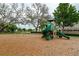 Community playground with slide and swing set at 8067 Crushed Pepper Ave, Orlando, FL 32817
