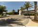 Exterior view of a modern community center with parking, palms, and colorful murals at 8268 Bellow St, Orlando, FL 32827