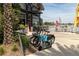 Outdoor dining at a waterfront restaurant with scooters and rental bikes is available to residents at 8268 Bellow St, Orlando, FL 32827