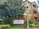 The Horizons at Stonebridge building and signage, surrounded by lush landscaping at 8775 Sartori St # 307, Orlando, FL 32829