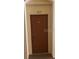 Image of a modern front door providing security and privacy for the unit at 8775 Sartori St # 307, Orlando, FL 32829