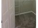 Walk-in closet featuring shelving for clothes and a carpeted floor at 8775 Sartori St # 307, Orlando, FL 32829