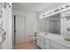 Bathroom with double sink vanity and shower at 879 Matt Ln, Port Orange, FL 32127