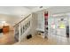 Entryway featuring a staircase and custom shelving for storage at 879 Matt Ln, Port Orange, FL 32127