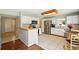 Bright kitchen featuring white cabinetry, stainless steel appliances, and a breakfast nook at 879 Matt Ln, Port Orange, FL 32127