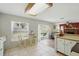 Cozy eat-in kitchen features bright natural light, a skylight and a view to the backyard at 879 Matt Ln, Port Orange, FL 32127