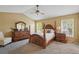 Spacious main bedroom with vaulted ceilings and furniture at 879 Matt Ln, Port Orange, FL 32127