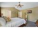 Main bedroom featuring vaulted ceilings and a TV at 879 Matt Ln, Port Orange, FL 32127