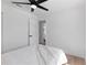 Simple bedroom features a closet and access to the ensuite bathroom at 9987 Triple Crown Cir, Orlando, FL 32825