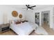 This primary bedroom features an ensuite bathroom and elegant decor at 9987 Triple Crown Cir, Orlando, FL 32825