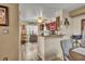 Efficient kitchen with a breakfast bar, modern appliances, and stylish decor overlooking the dining area at 3715 S Lake Orlando Pkwy # 11, Orlando, FL 32808