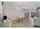 Bright dining room featuring a chandelier and ample natural light at 1012 Marisol Ct, Orlando, FL 32828