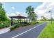 Tranquil lakeside gazebo and walking path for residents to enjoy nature views and exercise at 1012 Marisol Ct, Orlando, FL 32828