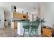 Cozy kitchen featuring updated cabinets and barstool seating at 1012 Marisol Ct, Orlando, FL 32828