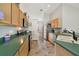 Well-equipped kitchen with stainless steel appliances and ample counter space at 1012 Marisol Ct, Orlando, FL 32828