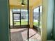 Relaxing screened patio area with brick pavers and neighborhood views at 10126 Beach Port Dr, Winter Garden, FL 34787