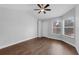 A cozy room with a ceiling fan, vinyl wood flooring, and natural light at 1013 Inlet Way, Altamonte Springs, FL 32714