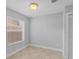Simple bedroom with large window and closet at 1013 Inlet Way, Altamonte Springs, FL 32714