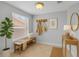 Comfortable entryway with storage bench, decor and natural light at 1013 Inlet Way, Altamonte Springs, FL 32714
