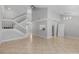 Spacious living room featuring a staircase, open floor plan and natural light at 1013 Inlet Way, Altamonte Springs, FL 32714