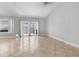 Spacious living room with tile floors, bright natural light, and neutral paint at 1013 Inlet Way, Altamonte Springs, FL 32714