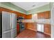 Well-equipped kitchen featuring stainless steel appliances and ample counter space at 10143 Pink Carnation Ct, Orlando, FL 32825